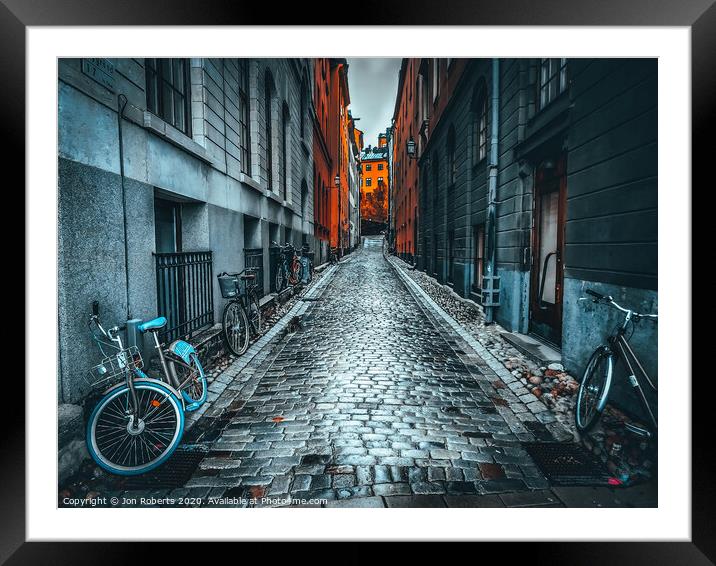 Cobbles and cycles Framed Mounted Print by Jon Roberts
