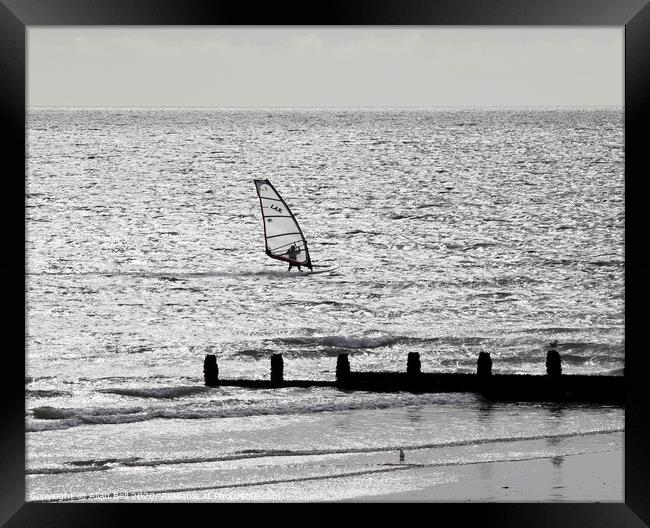 Wind surfer 0ff Bognor Beach Framed Print by Allan Bell