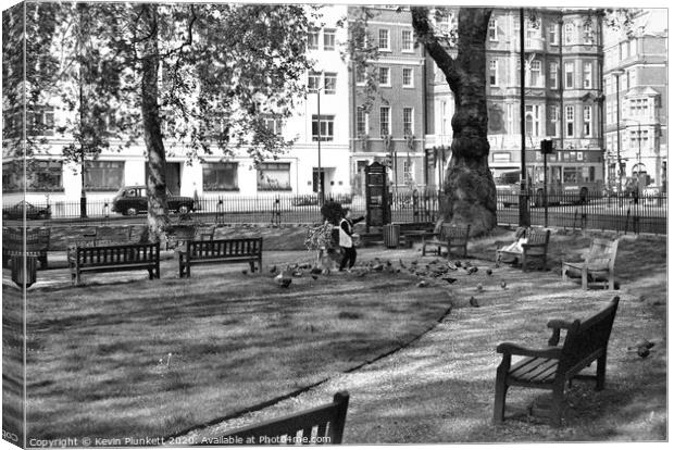Tai Chi in Berkeley Square London Canvas Print by Kevin Plunkett