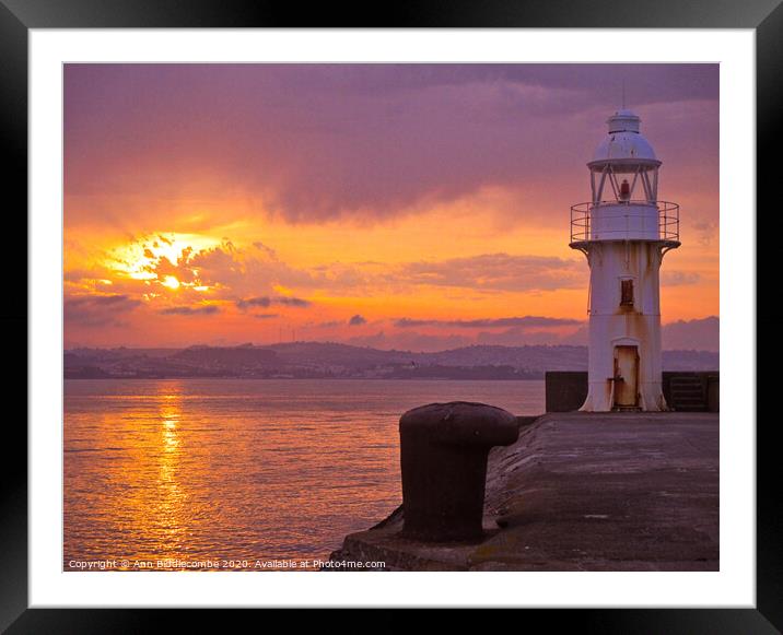 Sunset over Brixham Lighthouse Framed Mounted Print by Ann Biddlecombe
