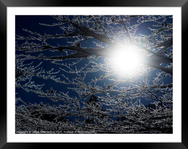 sun's rays in winter Framed Mounted Print by Sergio Delle Vedove