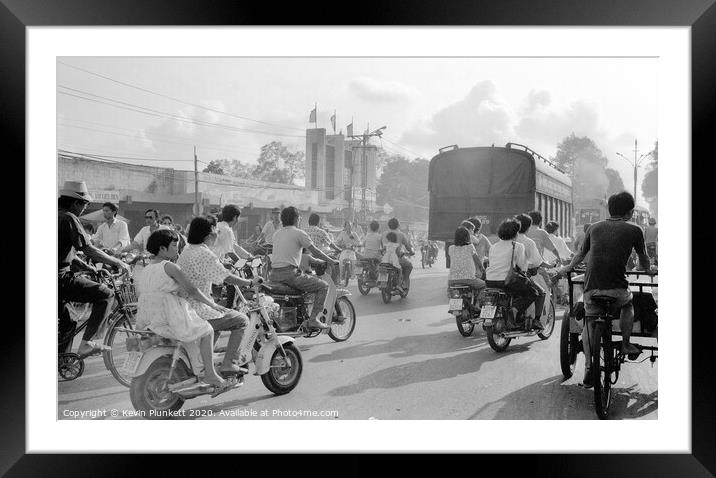 Rush hour in Ho Chi Minh City, Vietnam Framed Mounted Print by Kevin Plunkett