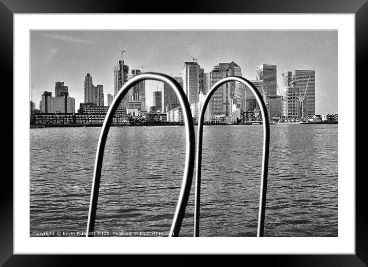 Looking at the Isle of Dogs from Greenwich Framed Mounted Print by Kevin Plunkett