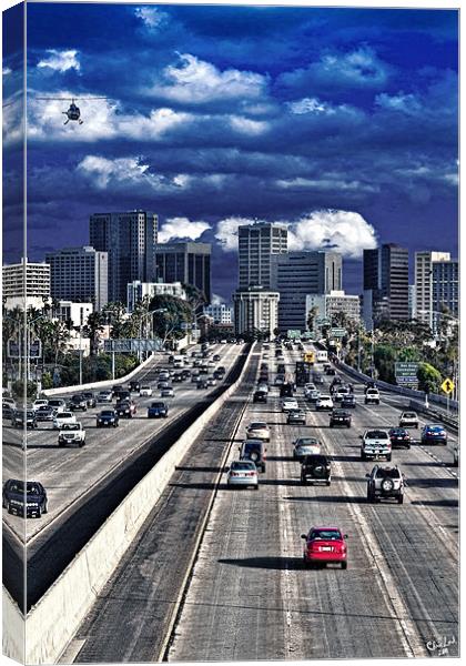 It's 5:00pm, downtown next exit Canvas Print by Chris Lord