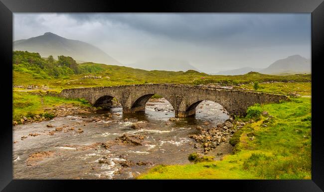 Sligachan bridge by the River Sligachan, on a overcast summers morning on the Isle of Skye, Scotland, with the Cuillin Mountains in the background. Framed Print by SnapT Photography