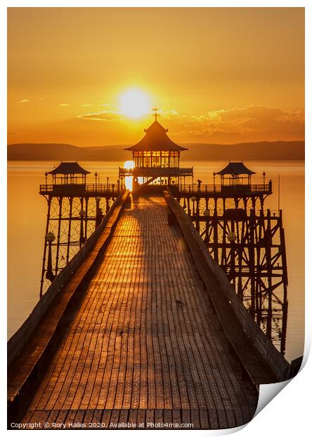 Clevedon Pier with a golden reflection Print by Rory Hailes