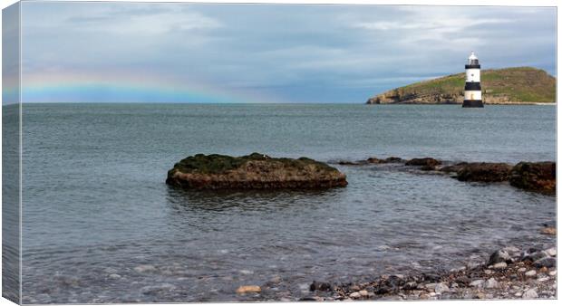 Majestic Rainbow over Penmon Lighthouse Canvas Print by Wendy Williams CPAGB
