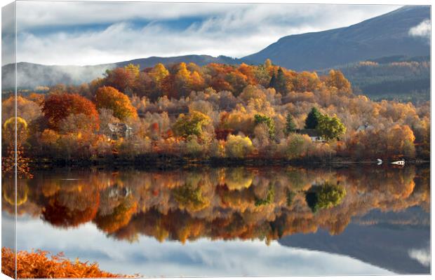 Autumn Reflections on Loch Garry Canvas Print by Derek Beattie
