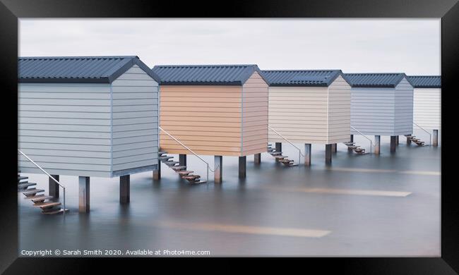 Beach Huts at Osea View Framed Print by Sarah Smith