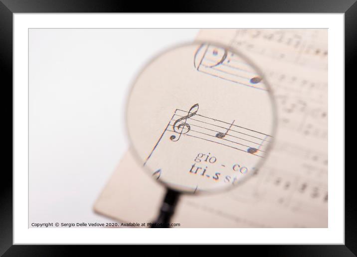 treble clef on a musical score Framed Mounted Print by Sergio Delle Vedove