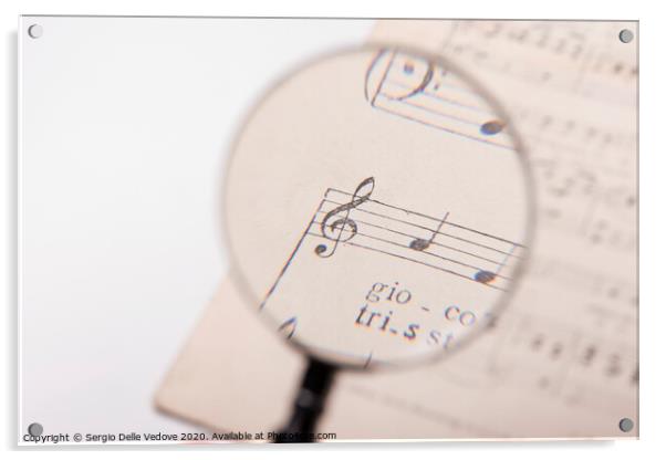 treble clef on a musical score Acrylic by Sergio Delle Vedove