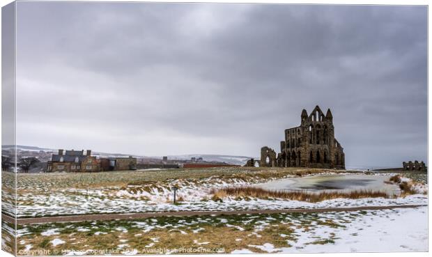 Whitby Abbey in the Snow  Canvas Print by Michael Copestake