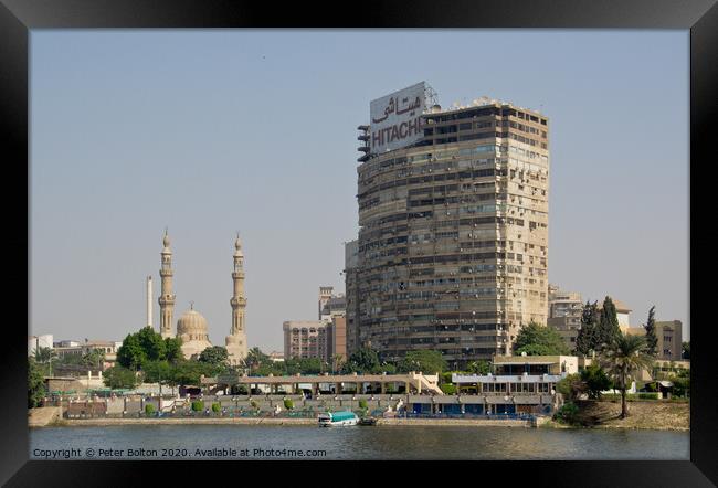 Ancient and modern cityscape, River Nile, Cairo, Egypt. Framed Print by Peter Bolton