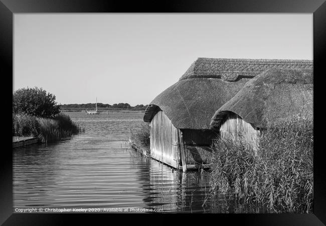 Hickling boathouses  Framed Print by Christopher Keeley