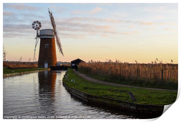 Sunset over Horsey Windpump Print by Christopher Keeley