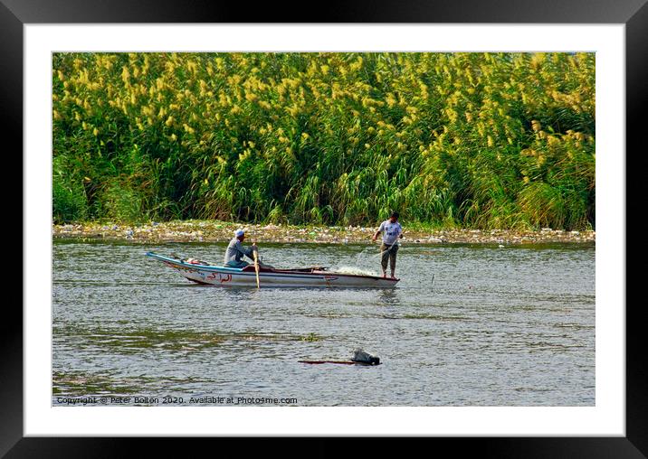 Fishermen in a boat on The River Nile near Cairo, Egypt. Framed Mounted Print by Peter Bolton