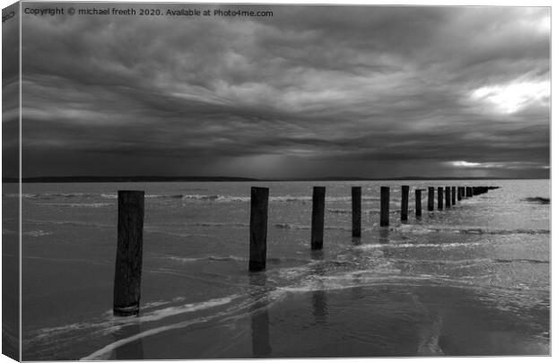 Stormy sky over Brean sands Canvas Print by michael freeth