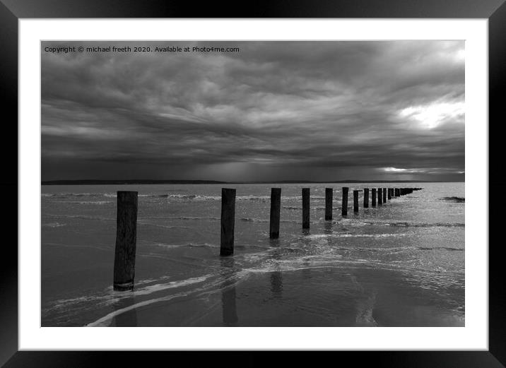 Stormy sky over Brean sands Framed Mounted Print by michael freeth