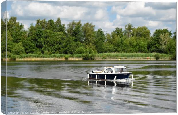 Boating on the Norfolk Broads Canvas Print by Christopher Keeley