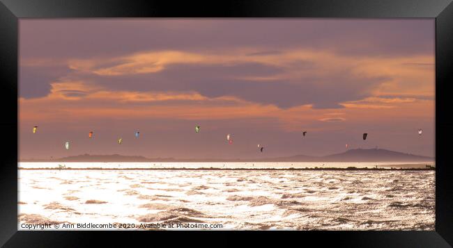 Kite Surfers over the Lake in Sete Framed Print by Ann Biddlecombe