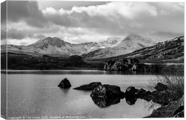 Snowy mountains and lake in Snowdonia Canvas Print by Tim Snow