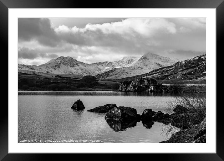Snowy mountains and lake in Snowdonia Framed Mounted Print by Tim Snow