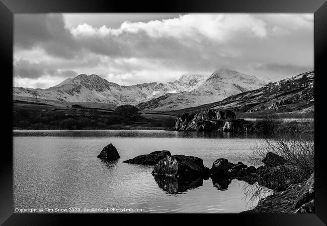 Snowy mountains and lake in Snowdonia Framed Print by Tim Snow
