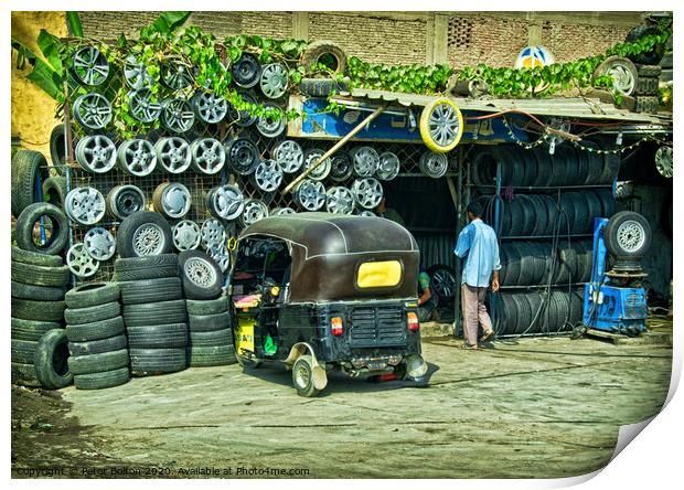 Tyre fitter business on the outskirts of Cairo, Egypt. Print by Peter Bolton