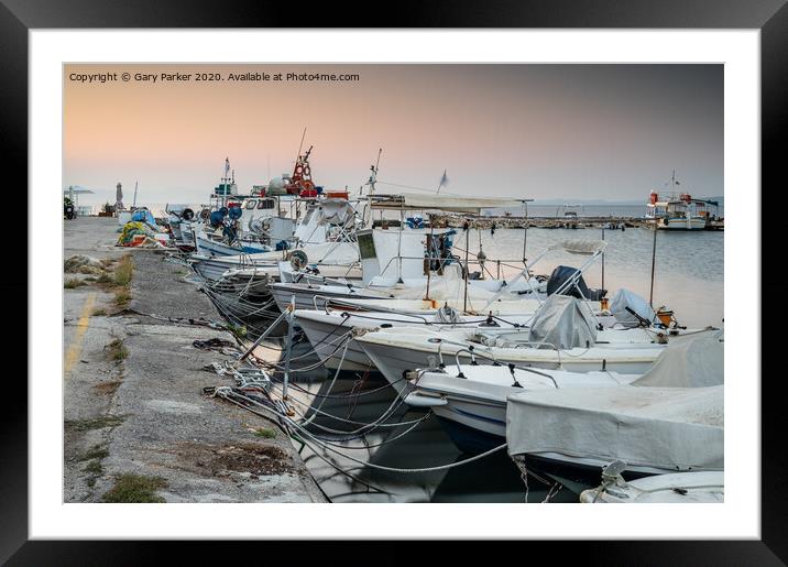 A row of fishing boats in Corfu, Greece	 Framed Mounted Print by Gary Parker