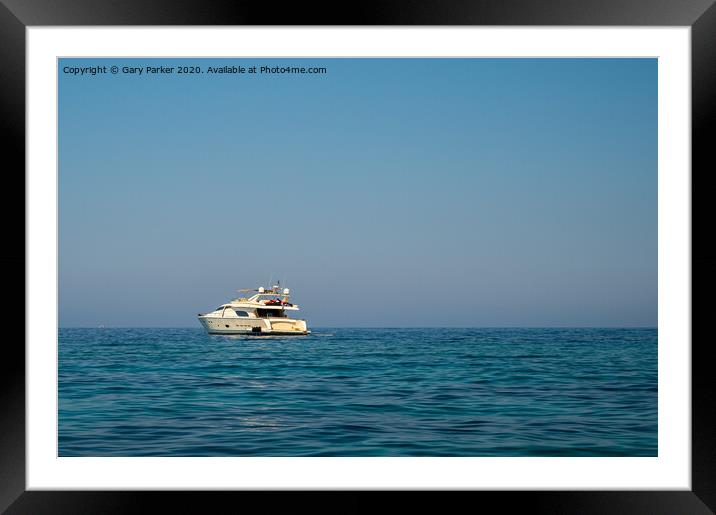 A large motorboat, in the Mediterranean sea, on a summers day	 Framed Mounted Print by Gary Parker