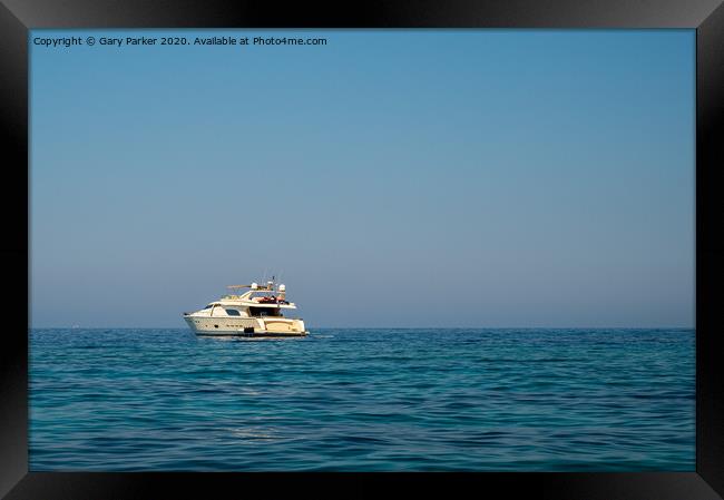 A large motorboat, in the Mediterranean sea, on a summers day	 Framed Print by Gary Parker