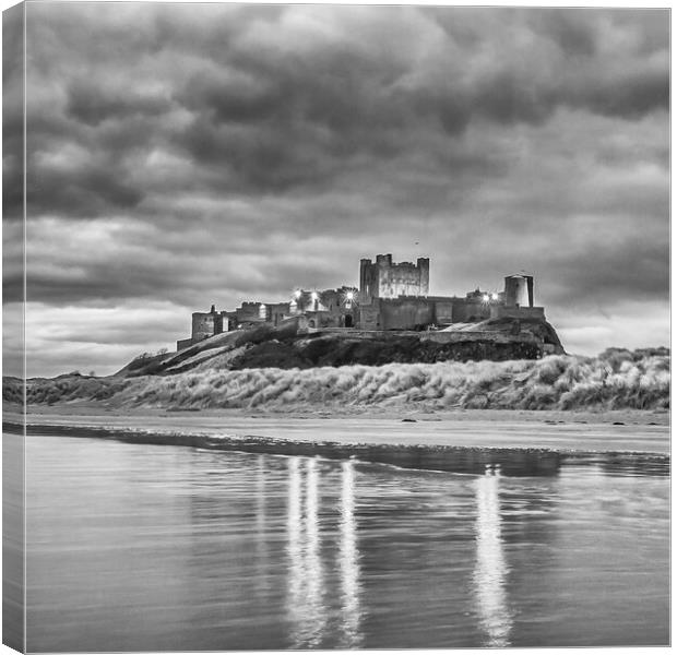 Bamburgh Castle reflections black and white  Canvas Print by Naylor's Photography