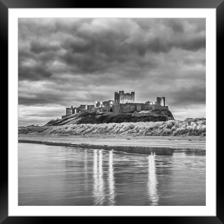 Bamburgh Castle reflections black and white  Framed Mounted Print by Naylor's Photography