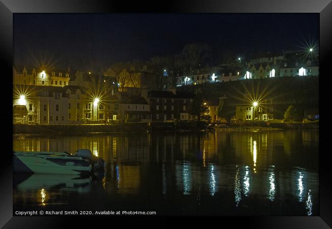 Illuminated buildings at the beach end of Portree Harbour Framed Print by Richard Smith