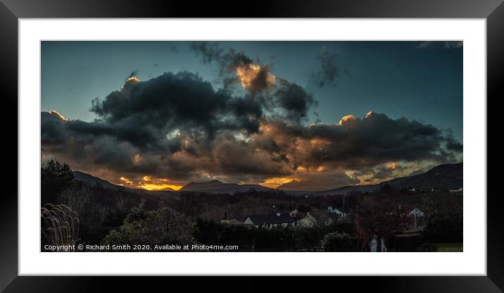 Clouds backlit by the early rising sun Framed Mounted Print by Richard Smith