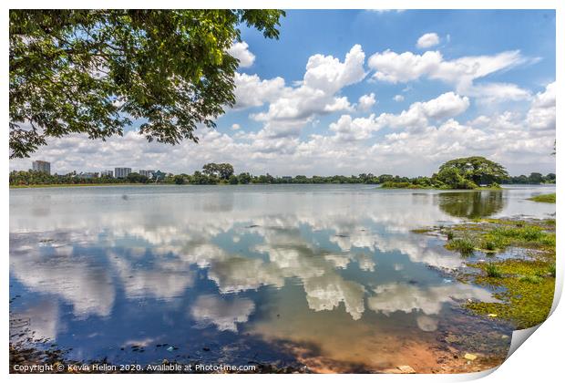 Cloud reflections in Inya Lake, Yangon, Myanmar Print by Kevin Hellon