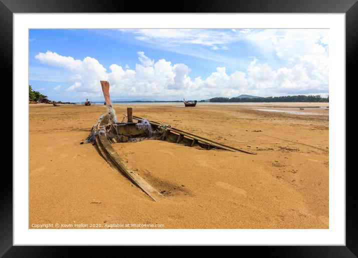 Old boat buried in the sand Framed Mounted Print by Kevin Hellon