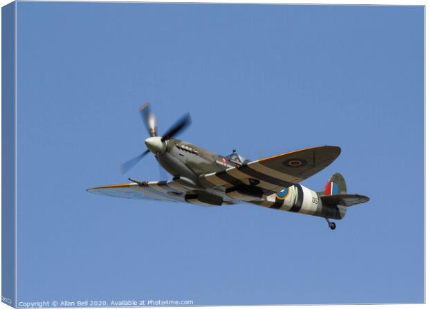 Majestic Spitfire flies through the sky Canvas Print by Allan Bell