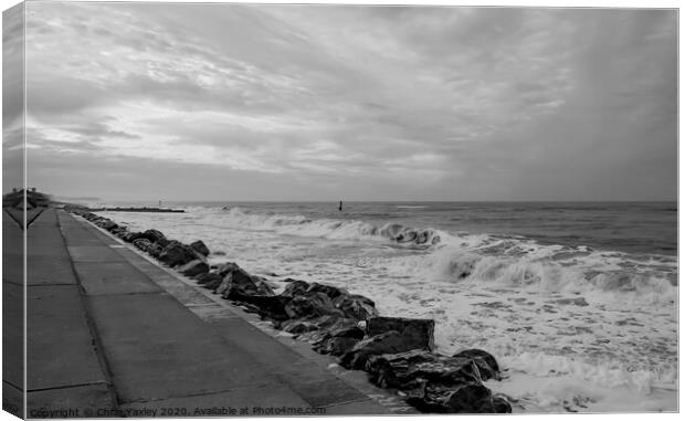 High tide at Cart Gap beach on an overcast evening Canvas Print by Chris Yaxley