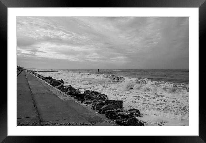 High tide at Cart Gap beach on an overcast evening Framed Mounted Print by Chris Yaxley