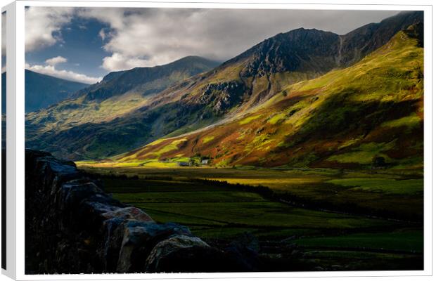 Sun dappled mountains in Snowdonia Canvas Print by Peter Taylor