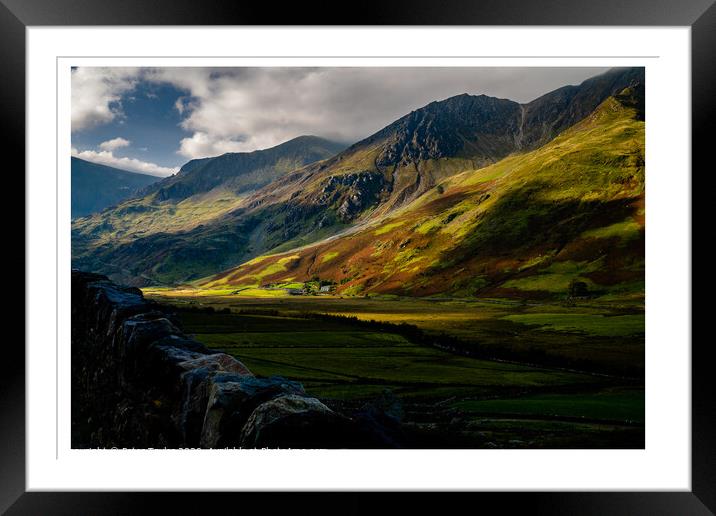 Sun dappled mountains in Snowdonia Framed Mounted Print by Peter Taylor