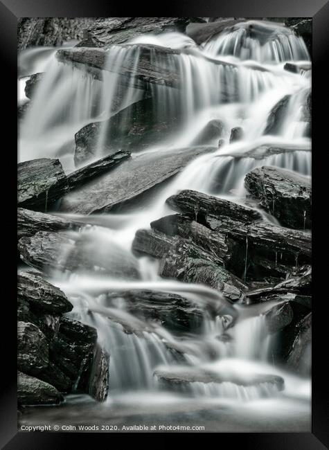 Detail of waterfalls in a stream taken as a long time exposure Framed Print by Colin Woods