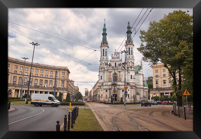 Warsaw, Poland - June 01, 2017: Church of the Holiest Saviour, plac Zbawiciela, Saviour Square, Srodmiescie Poludniowe located in Central Europe against cloudy sky Framed Print by Arpan Bhatia