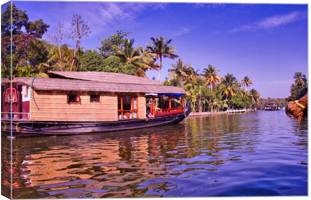 House boat in a the city of Kerala back waters in India Canvas Print by Arpan Bhatia