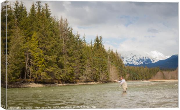 A fly fisherman casting on the Kalum River in British Columbia, Canada Canvas Print by SnapT Photography