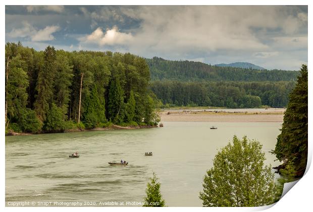 Fishermen fishing for salmon on the Skeena River below Terrace, during a cloudy day in summer, in British Columbia, Canada Print by SnapT Photography