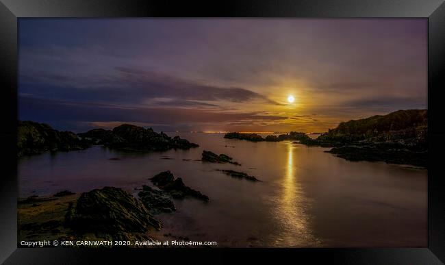 Serene Nighttime Seascape at Greencastle, Ireland Framed Print by KEN CARNWATH