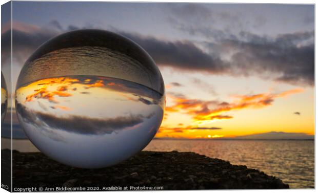 Sphere sunset over the lagoon in Sete Canvas Print by Ann Biddlecombe