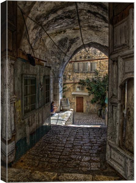 Secluded entry in the Old City, Jerusalem, Israel. Canvas Print by Peter Bolton